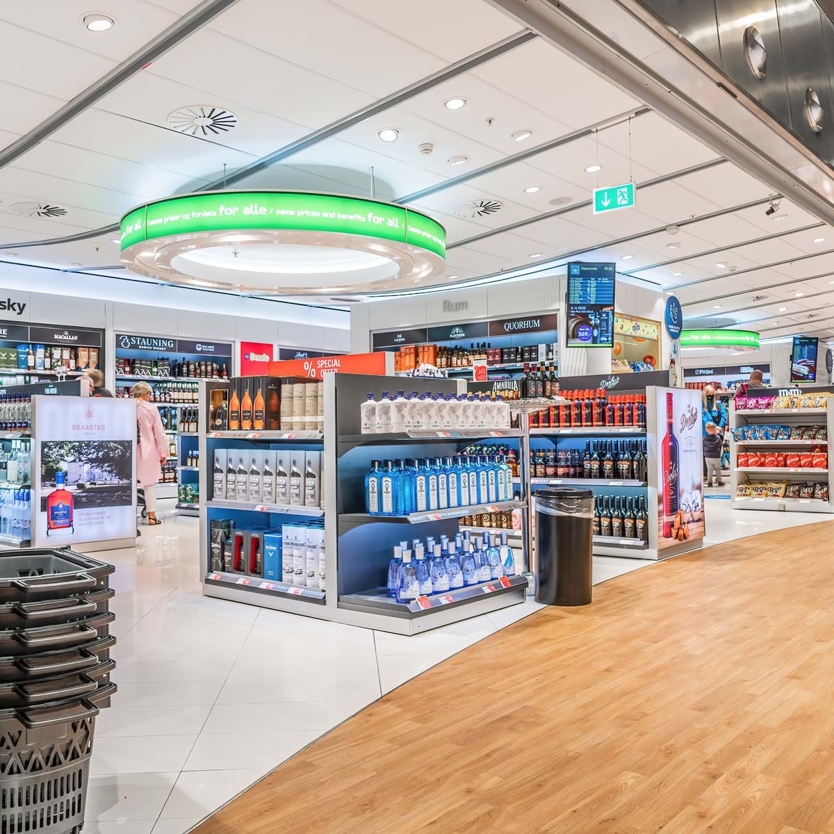 Interior of a tax-free shop at Billund Airport with shelves of spirits